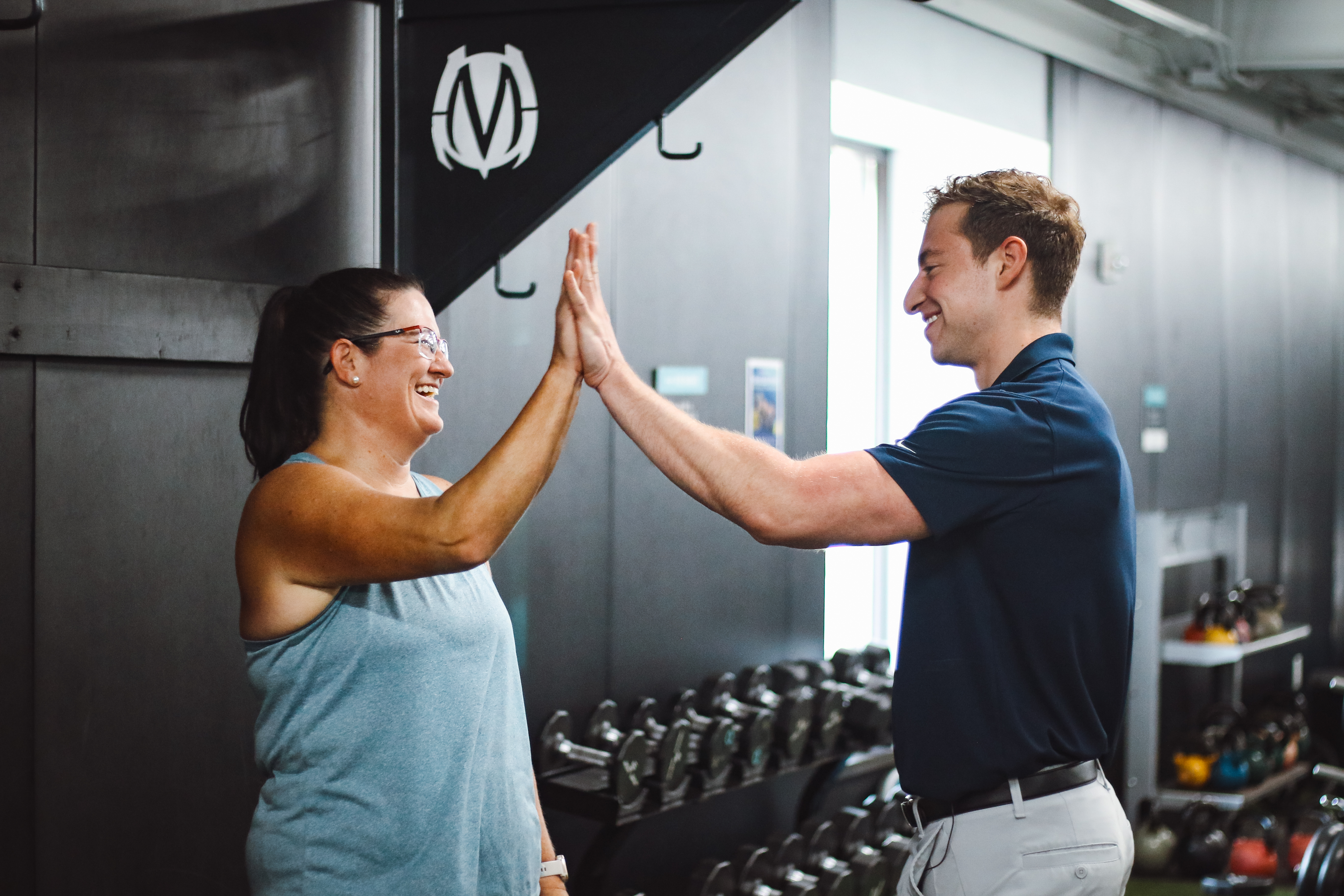 Jennifer and Dr. Adam Salzman High Fiving